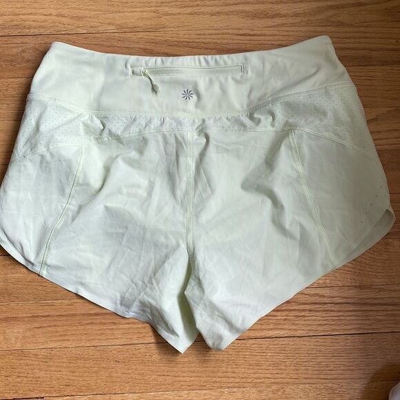 Athleta run with it short sz S pale yellow color EUC liner cinch tie pocket - Picture 1 of 6